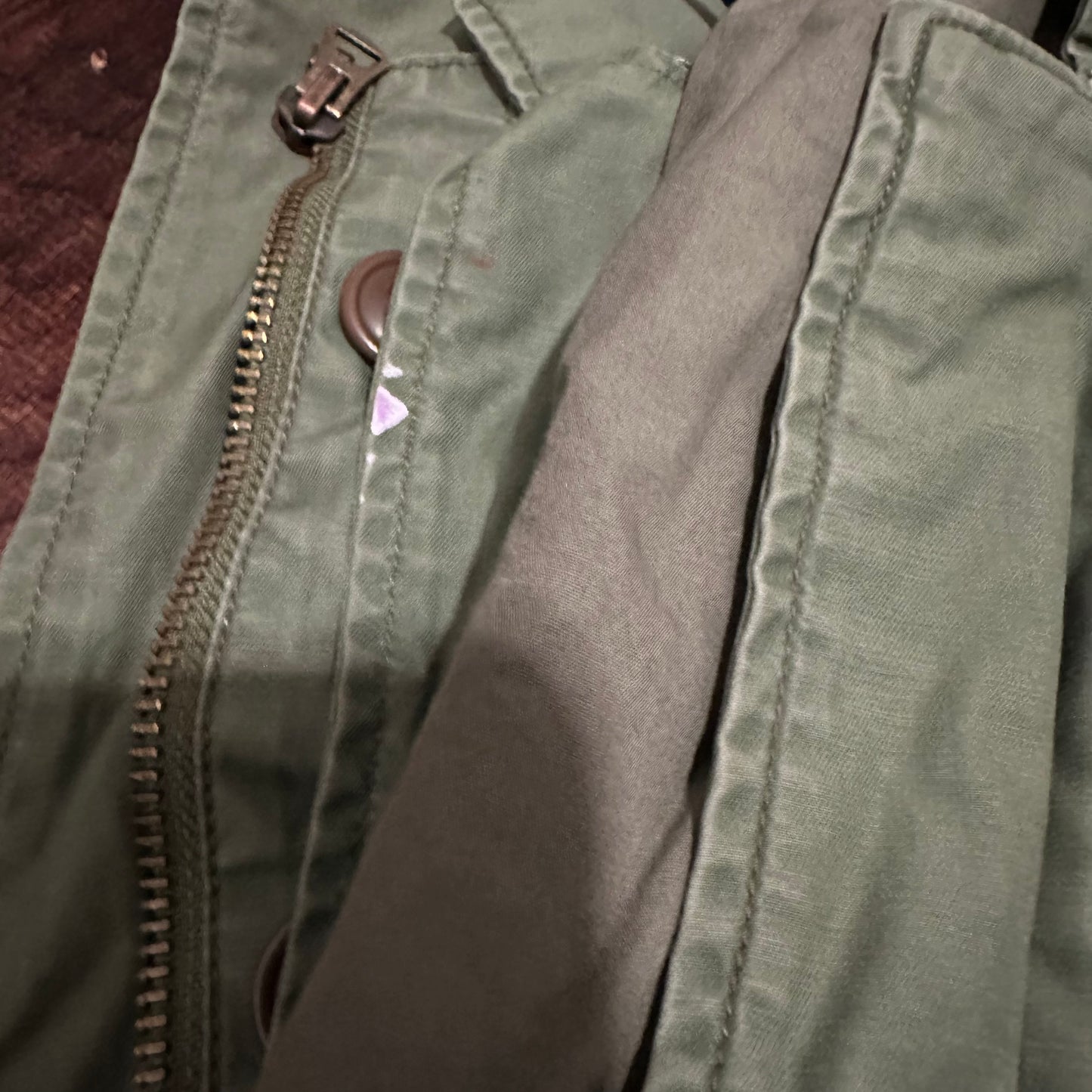 Woman’s olive jacket