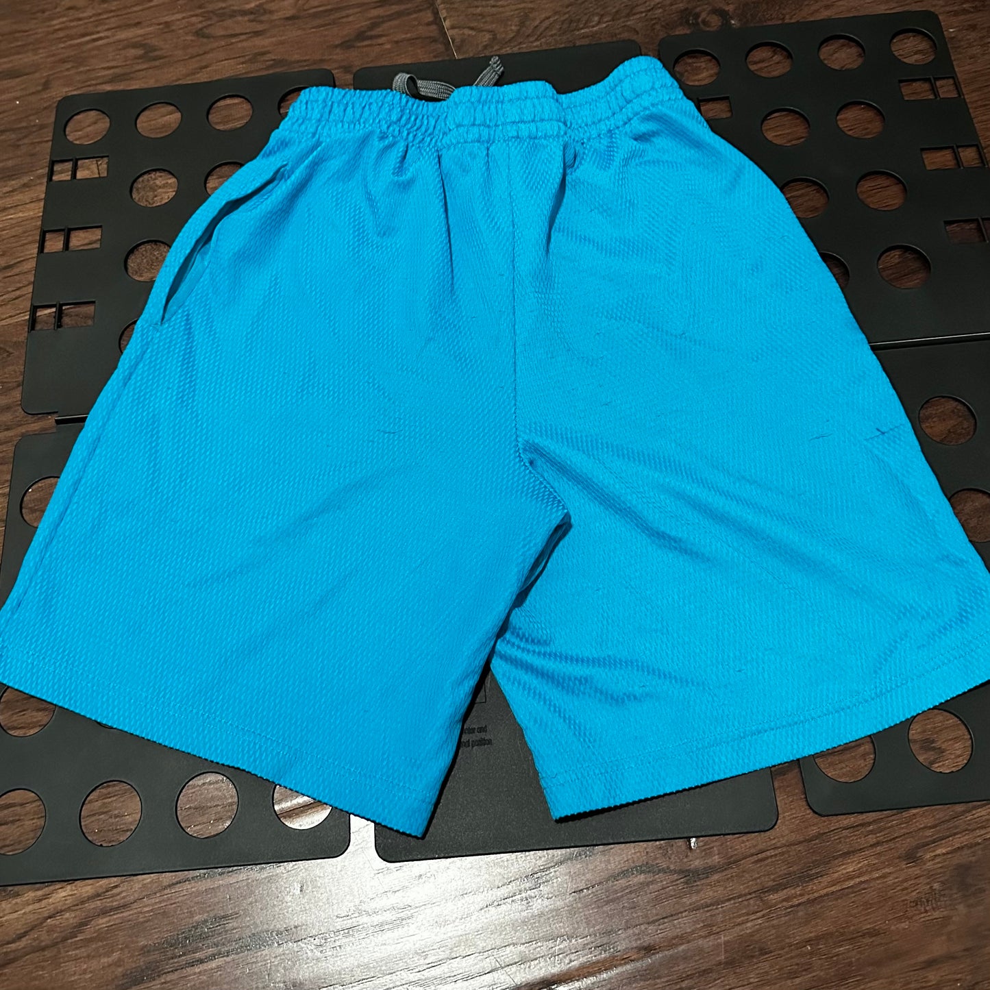 Athletic light blue shorts - Small (28-30)